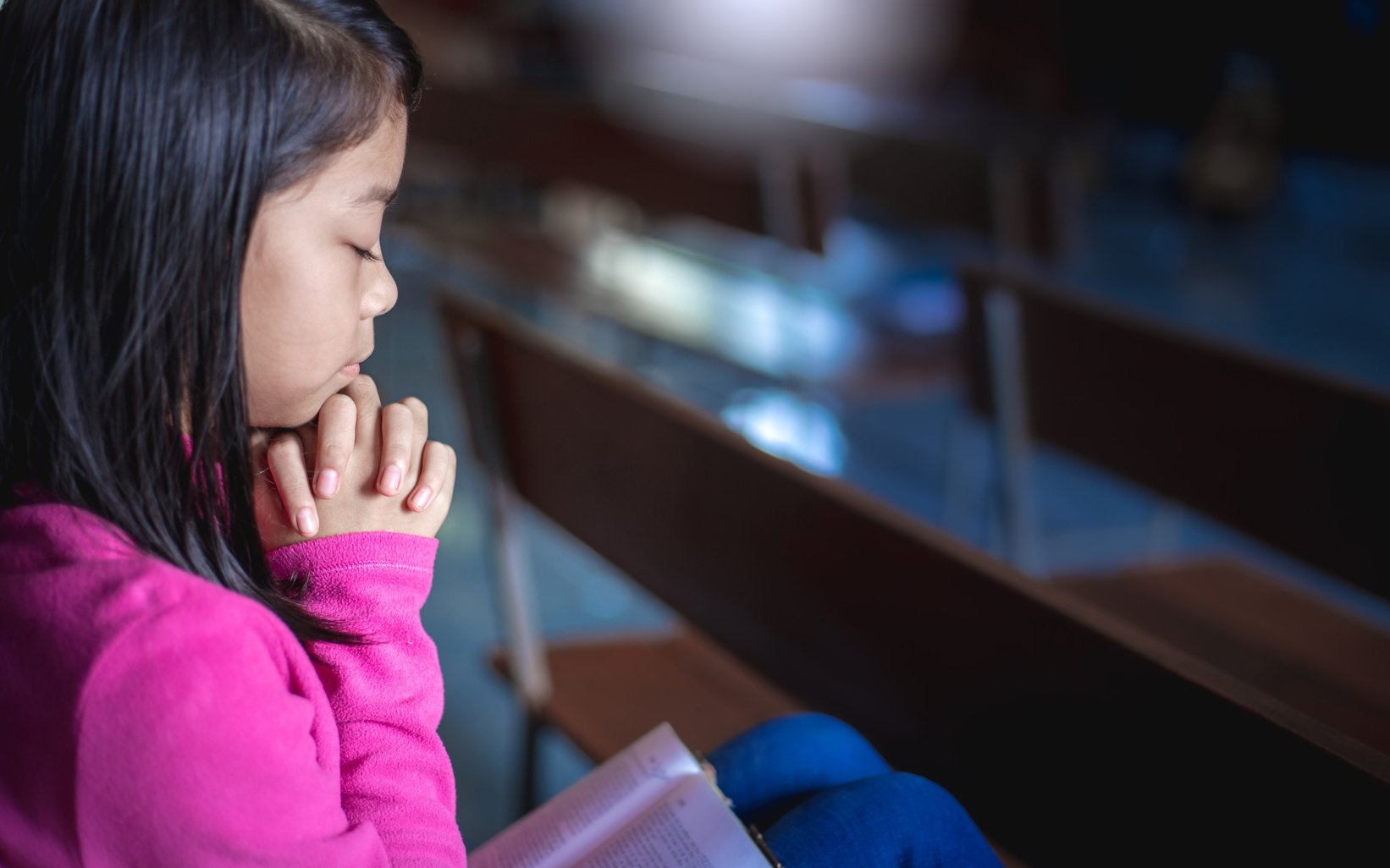 Girl Praying at Church